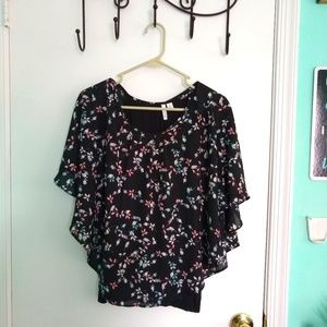 Black shirt with multi colored flowers